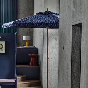 Navy blue parasol in a living room