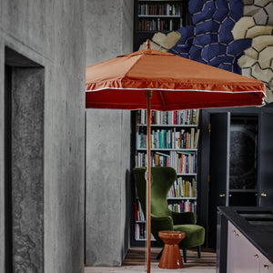 Orange parasol in a modern house