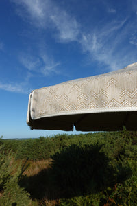 Beige patterned parasol