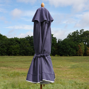 Navy blue parasol tied closed