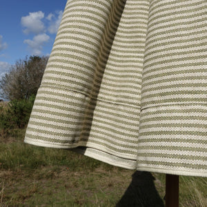 Green and cream striped parasol fabric